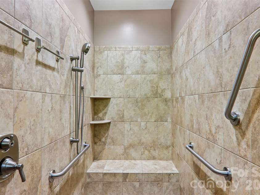 959 Silverglen Way, Hendersonville, NC 28792.  MLS# CAR4397996, YatesRealty ID 21071. Primary bath shower