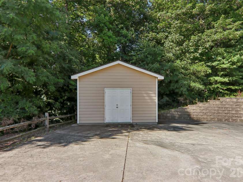959 Silverglen Way, Hendersonville, NC 28792.  MLS# CAR4397996, YatesRealty ID 21071. Storage shed included