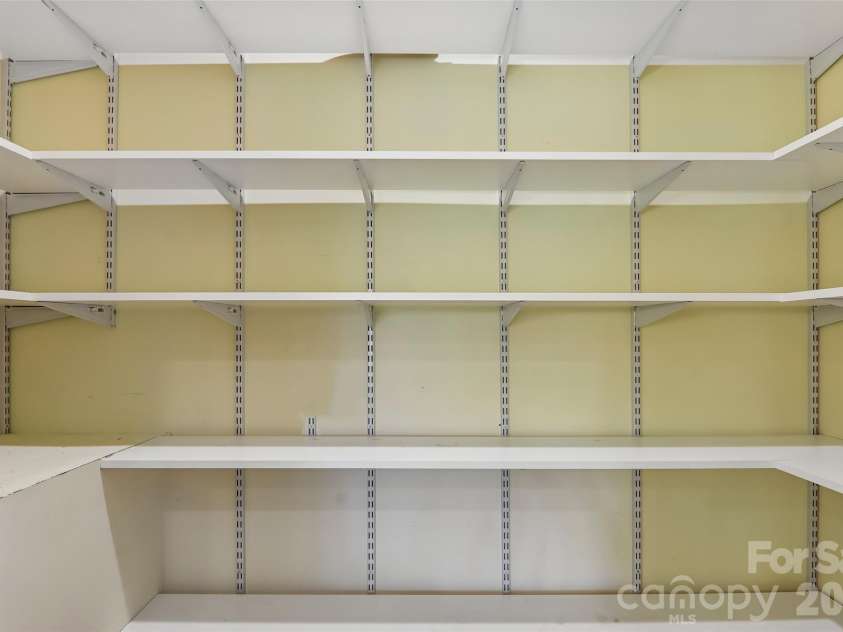 959 Silverglen Way, Hendersonville, NC 28792.  MLS# CAR4397996, YatesRealty ID 21071. Walk in pantry in kitchen