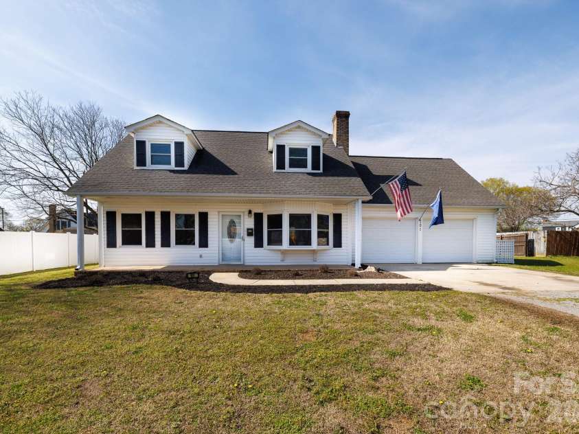 101 Woodland Drive, Clover, SC 29710.  MLS# CAR4357605, YatesRealty ID 21073. Front, porch paved driveway, double garage
