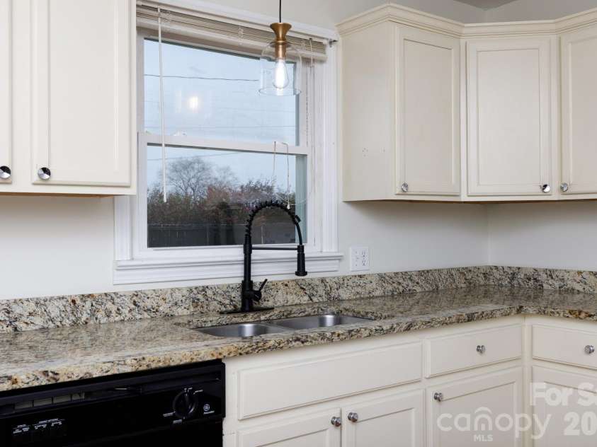 101 Woodland Drive, Clover, SC 29710.  MLS# CAR4357605, YatesRealty ID 21073. Widow to back yard
