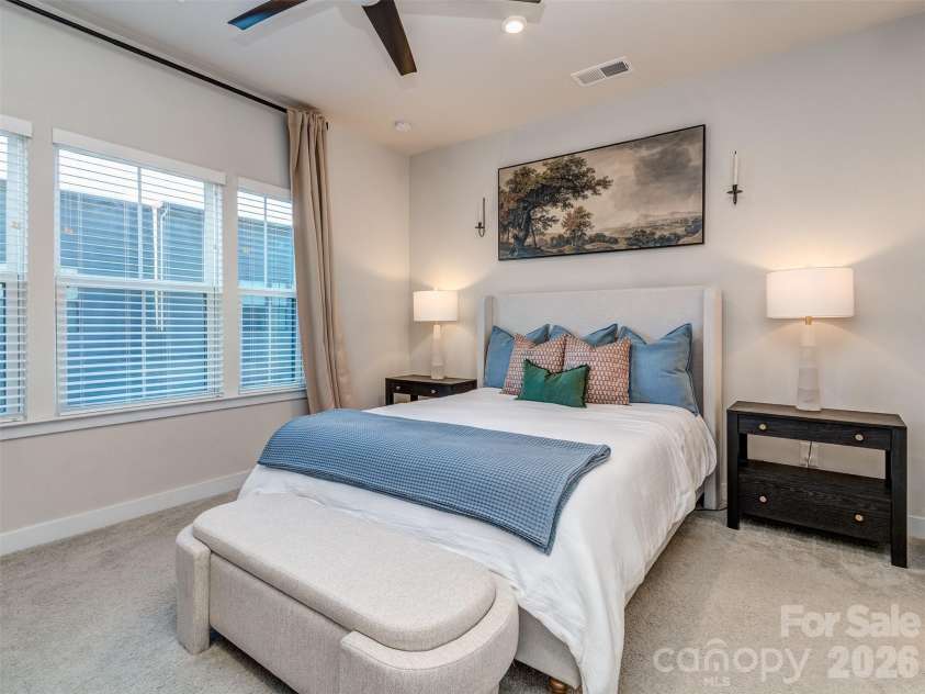 1033 Simcoe Lane, Charlotte, NC 28217.  MLS# CAR4358003, YatesRealty ID 21074. 2nd Floor Primary Suite with Custom Blinds, Ceiling Fan, & Private Bath!