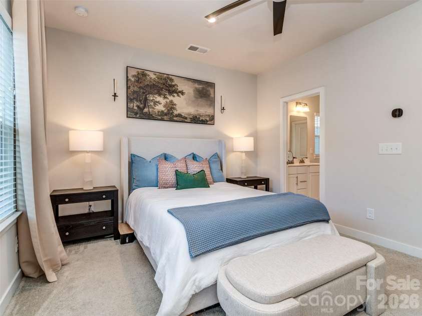 1033 Simcoe Lane, Charlotte, NC 28217.  MLS# CAR4358003, YatesRealty ID 21074. 2nd Floor Primary Suite with Custom Blinds, Ceiling Fan, & Private Bath!