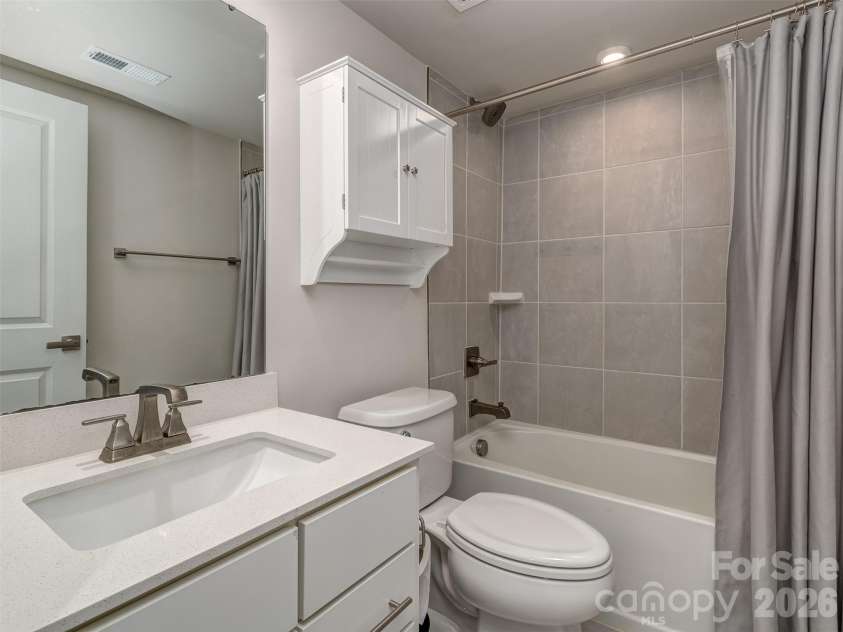 1033 Simcoe Lane, Charlotte, NC 28217.  MLS# CAR4358003, YatesRealty ID 21074. Lower Level Guest Suite with Private Bath