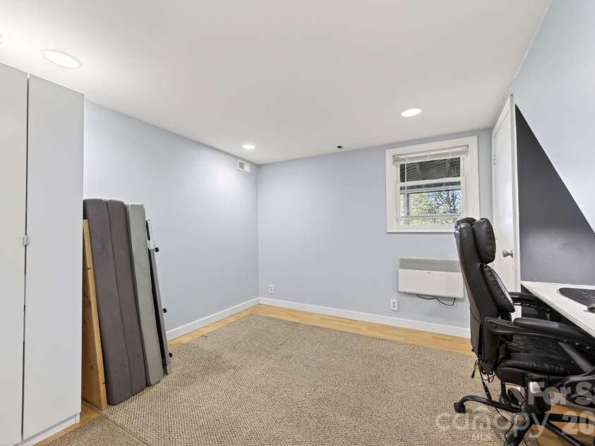 88 Ivanhoe Avenue, Asheville, NC 28806.  MLS# CAR4365927, YatesRealty ID 21080. Basement Bonus Room Currently Set-up As An Office
