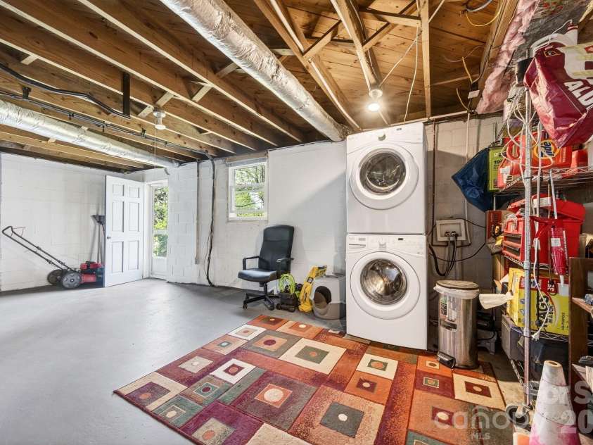 88 Ivanhoe Avenue, Asheville, NC 28806.  MLS# CAR4365927, YatesRealty ID 21080. Laundry in Basement With Exterior Entry