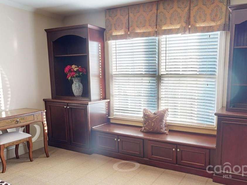 708 RidgeLake Drive, Weddington, NC 28104.  MLS# CAR4240805, YatesRealty ID 21081. 3rd floor built-in window seat and bookcases