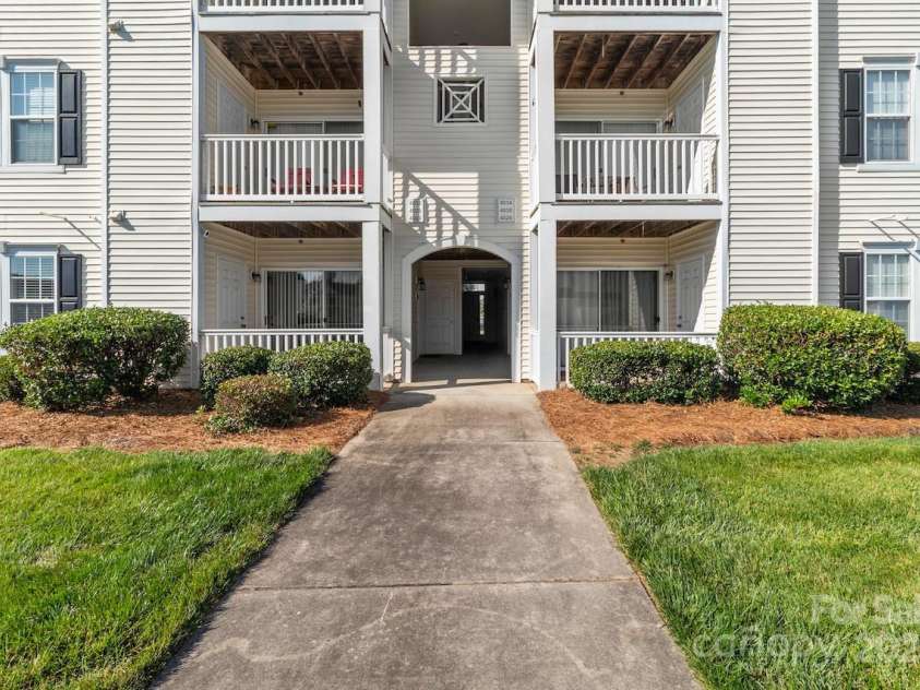 4024 Town Center Road, Harrisburg, NC 28075.  MLS# CAR4270492, YatesRealty ID 21086. Rear of unit