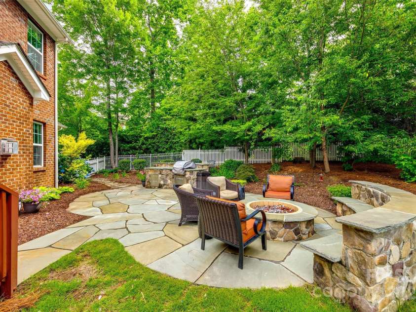 4711 Pearmain Drive, Waxhaw, NC 28173.  MLS# CAR4246425, YatesRealty ID 21087. Custom gas fire pit w/seating