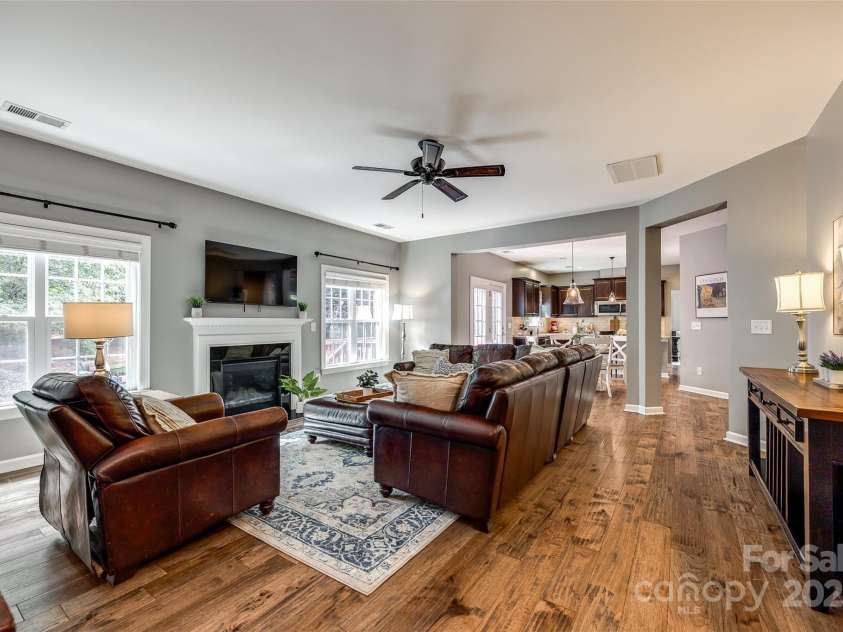 4711 Pearmain Drive, Waxhaw, NC 28173.  MLS# CAR4246425, YatesRealty ID 21087. Family room with fireplace