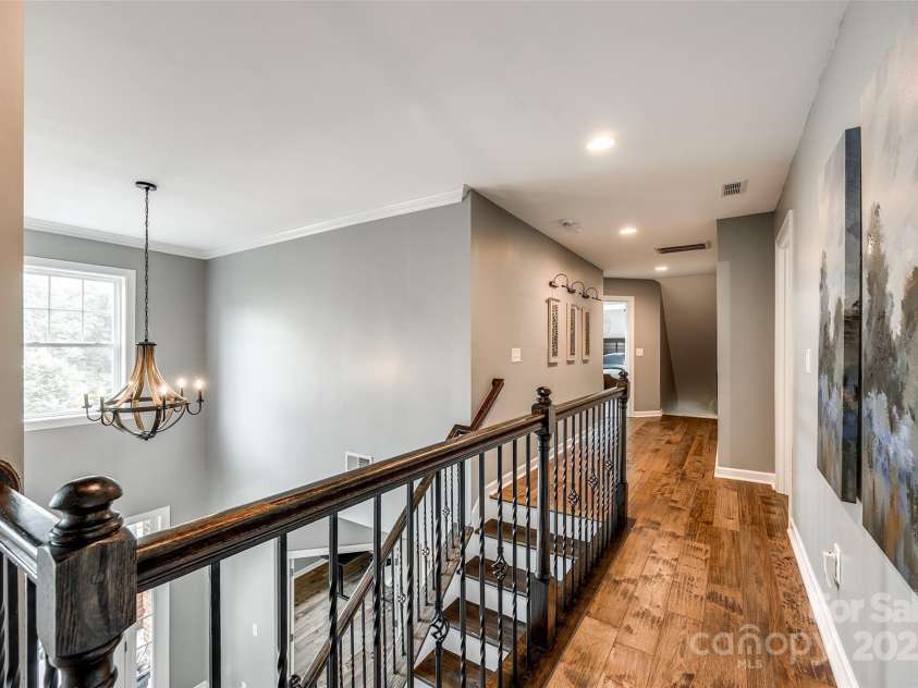 4711 Pearmain Drive, Waxhaw, NC 28173.  MLS# CAR4246425, YatesRealty ID 21087. Hardwoods continue in hallways upstairs