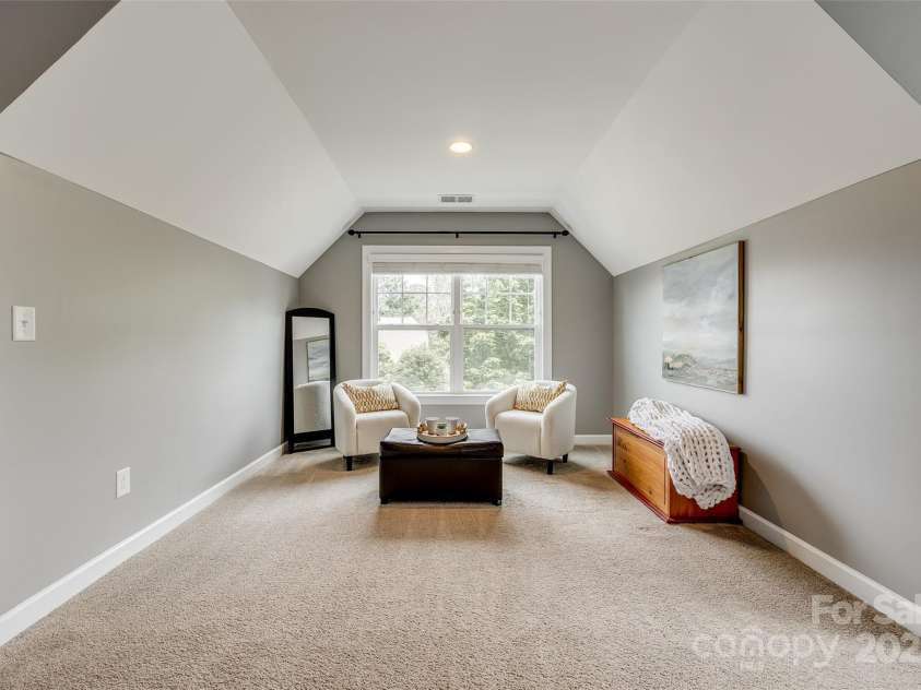 4711 Pearmain Drive, Waxhaw, NC 28173.  MLS# CAR4246425, YatesRealty ID 21087. Primary bedroom w/ sitting area