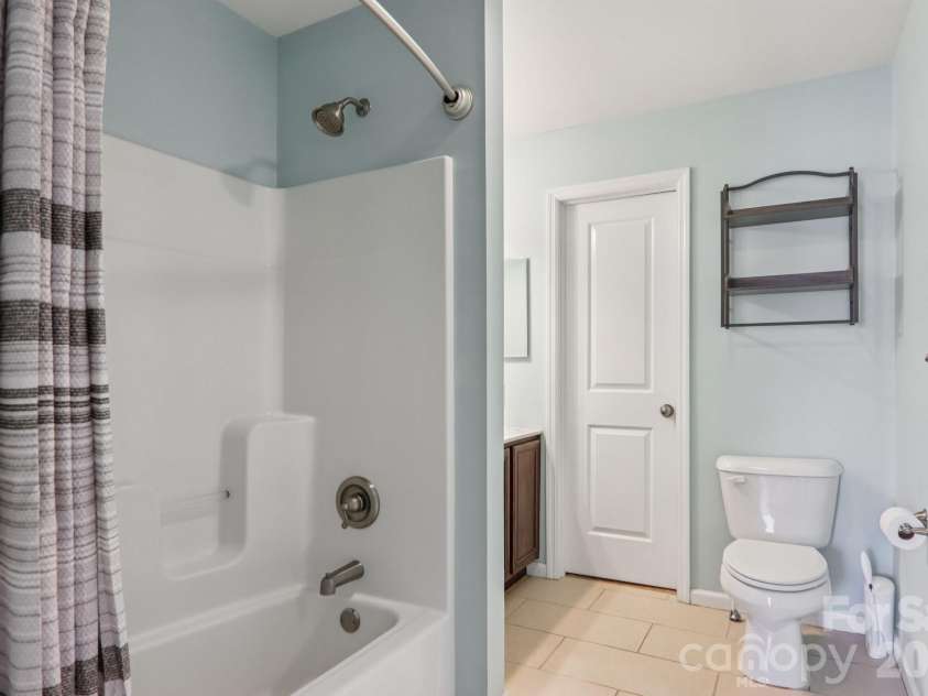 751 Hutch Mountain Road, Fletcher, NC 28732.  MLS# CAR4346461, YatesRealty ID 21087. Primary bathroom