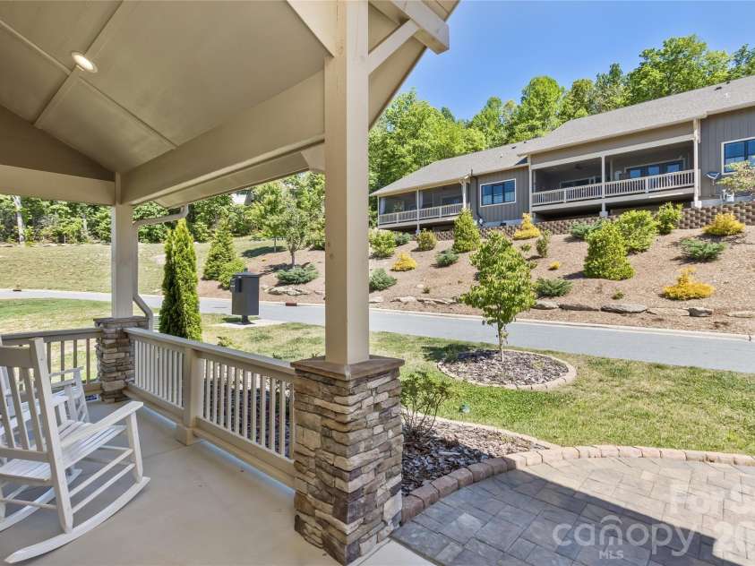 96 Copper Valley Lane, Hendersonville, NC 28739.  MLS# CAR4376477, YatesRealty ID 21094. Covered Front Porch