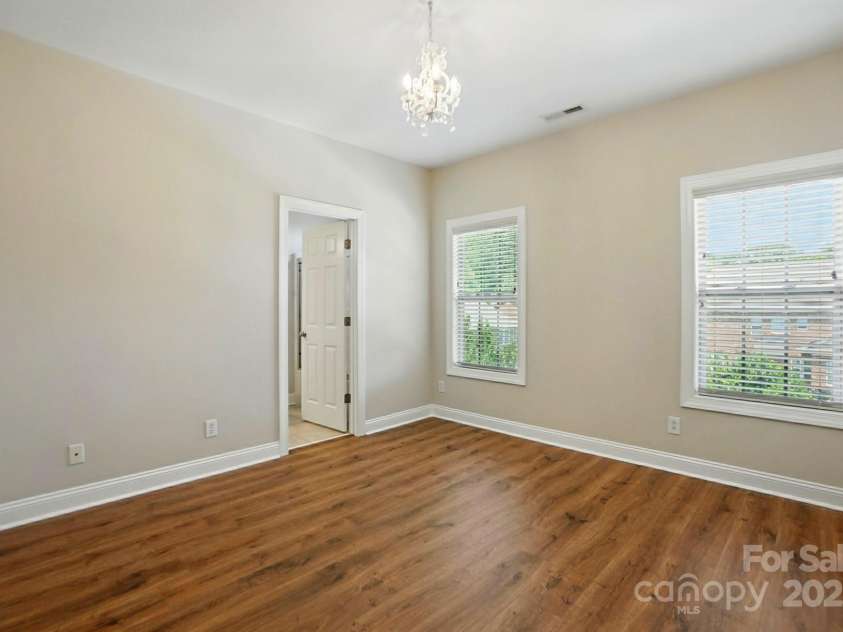7903 Tottenham Court, Waxhaw, NC 28173.  MLS# CAR4270692, YatesRealty ID 21096. Secondary Bedroom with walk-in closet and direct access to bathroom