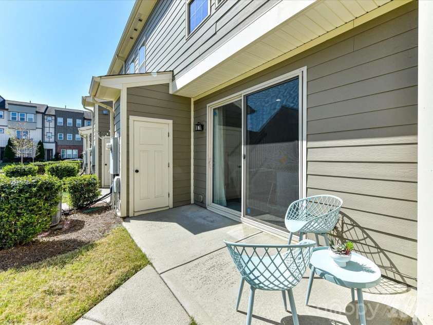 2718 Tranquil Oak Place, Charlotte, NC 28206.  MLS# CAR4362826, YatesRealty ID 21098. Back patio and storage room