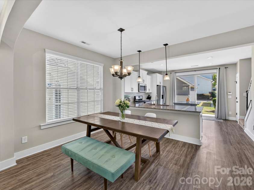 2718 Tranquil Oak Place, Charlotte, NC 28206.  MLS# CAR4362826, YatesRealty ID 21098. Dining area and kitchen