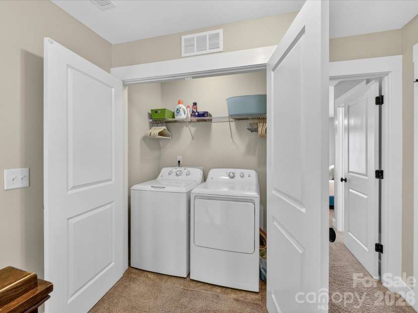 2718 Tranquil Oak Place, Charlotte, NC 28206.  MLS# CAR4362826, YatesRealty ID 21098. Laundry room and storage