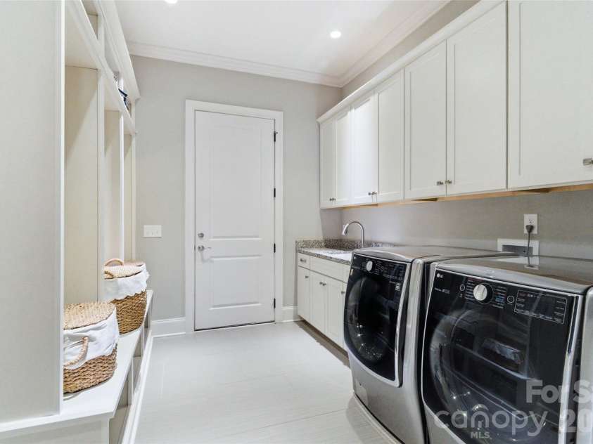 3097 Sherman Drive, Lancaster, SC 29720.  MLS# CAR4366322, YatesRealty ID 21103. Oversized laundry room with ample storage