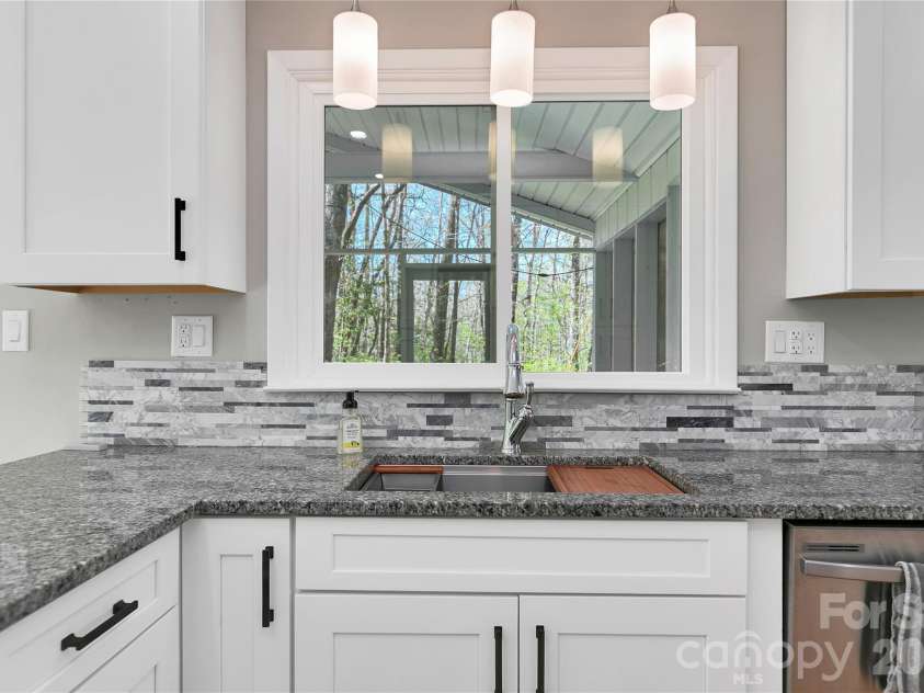 359 Rainbow Lake Drive, Brevard, NC 28712.  MLS# CAR4364404, YatesRealty ID 21110. 