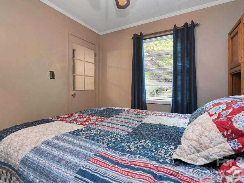 520 Blythe Road, Pisgah Forest, NC 28768.  MLS# CAR4370794, YatesRealty ID 21111. Bedroom 1