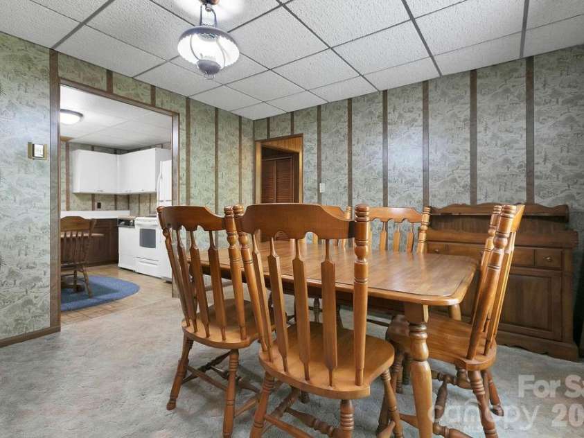 520 Blythe Road, Pisgah Forest, NC 28768.  MLS# CAR4370794, YatesRealty ID 21111. Dining Room to Kitchen