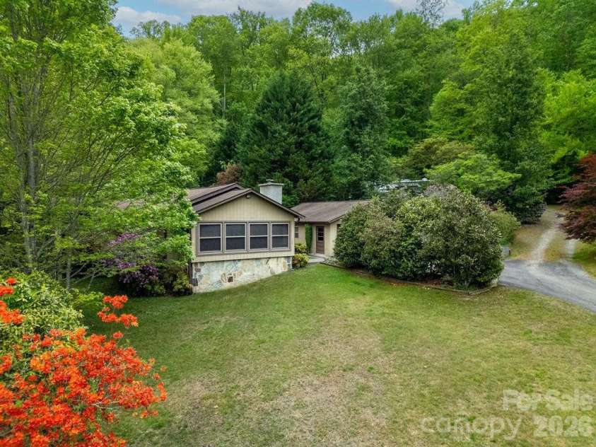 520 Blythe Road, Pisgah Forest, NC 28768.  MLS# CAR4370794, YatesRealty ID 21111. Gorgeous Plants and Lanscaping