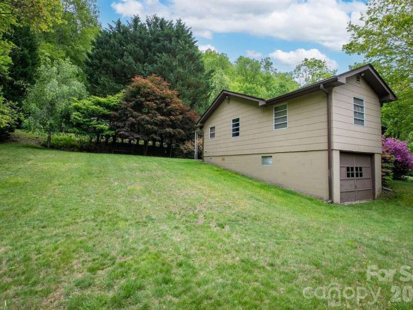 520 Blythe Road, Pisgah Forest, NC 28768.  MLS# CAR4370794, YatesRealty ID 21111. Large Back Yard