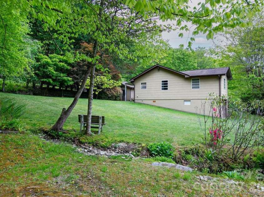 520 Blythe Road, Pisgah Forest, NC 28768.  MLS# CAR4370794, YatesRealty ID 21111. Small Stream