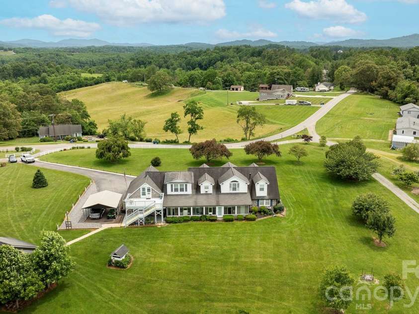727 Jenkins Valley Road, Alexander, NC 28701.  MLS# CAR4357039, YatesRealty ID 21116. Aerial showcasing the panoramic long range