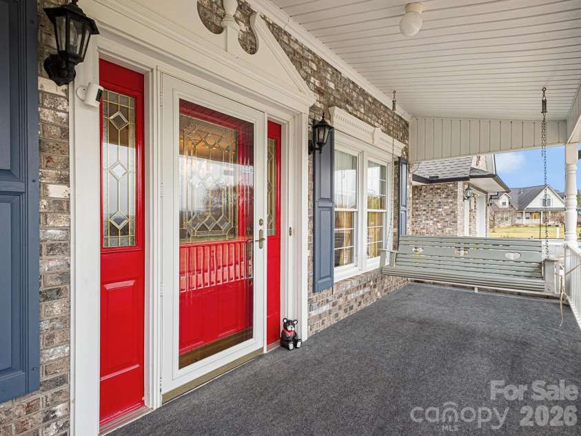 727 Jenkins Valley Road, Alexander, NC 28701.  MLS# CAR4357039, YatesRealty ID 21116. Covered front porch at front entry