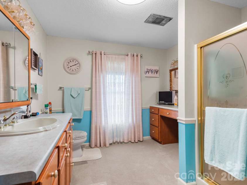 727 Jenkins Valley Road, Alexander, NC 28701.  MLS# CAR4357039, YatesRealty ID 21116. Guest bathroom on main