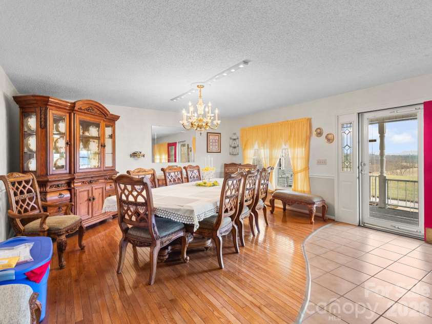 727 Jenkins Valley Road, Alexander, NC 28701.  MLS# CAR4357039, YatesRealty ID 21116. Living room