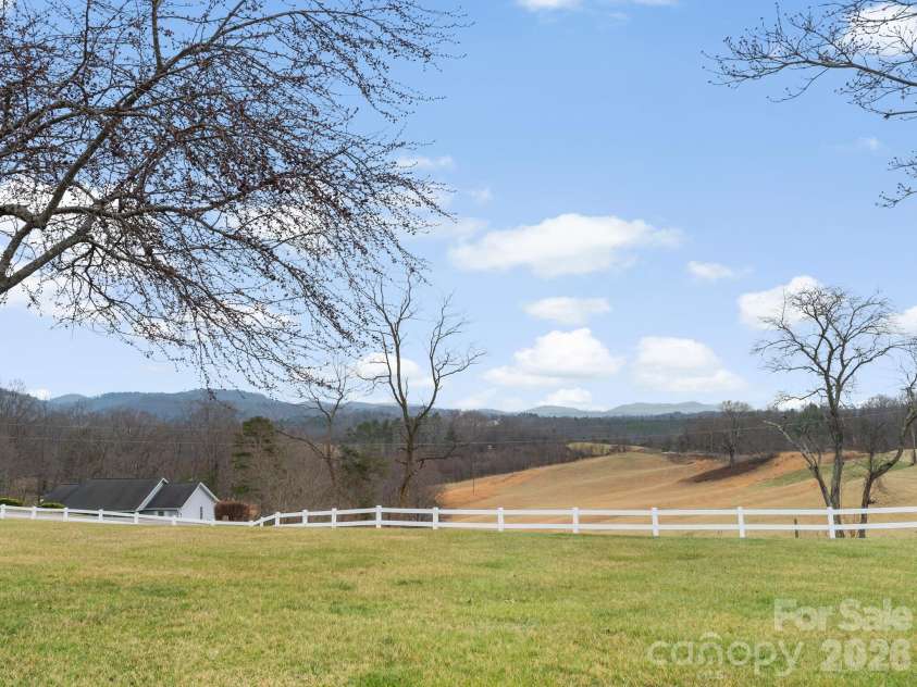 727 Jenkins Valley Road, Alexander, NC 28701.  MLS# CAR4357039, YatesRealty ID 21116. Long range views  from the front yard - winter or summer!