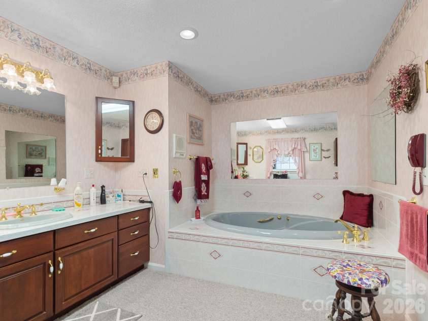727 Jenkins Valley Road, Alexander, NC 28701.  MLS# CAR4357039, YatesRealty ID 21116. Primary bathroom
