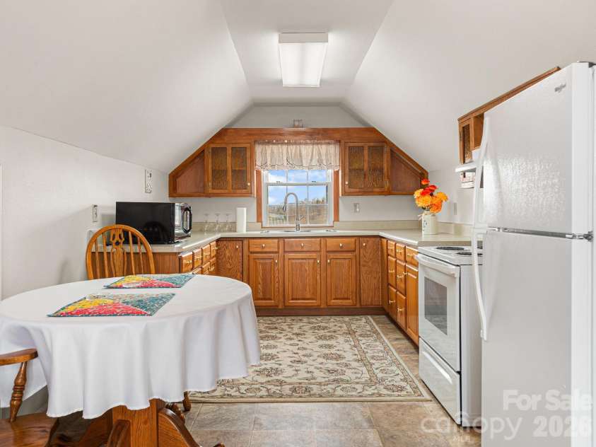 727 Jenkins Valley Road, Alexander, NC 28701.  MLS# CAR4357039, YatesRealty ID 21116. Upstairs kitchen