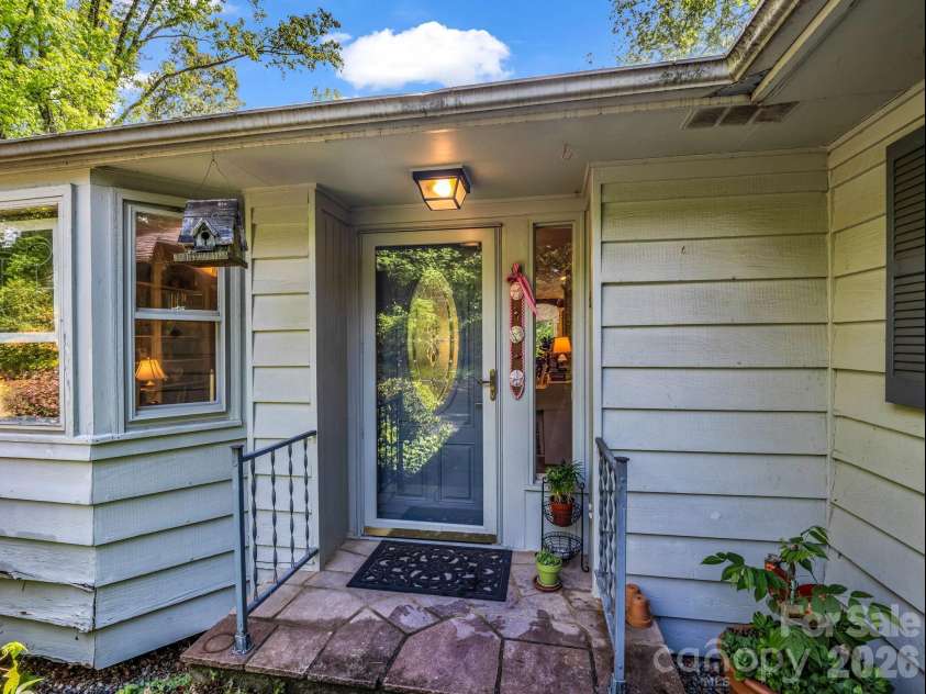 57 Tate Lane, Tryon, NC 28782.  MLS# CAR4378225, YatesRealty ID 21117. 
