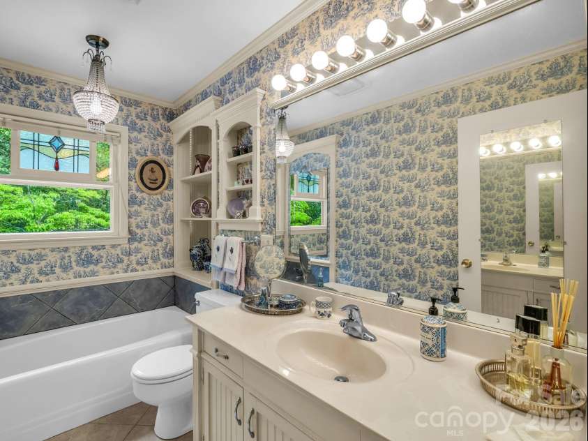 57 Tate Lane, Tryon, NC 28782.  MLS# CAR4378225, YatesRealty ID 21117. 