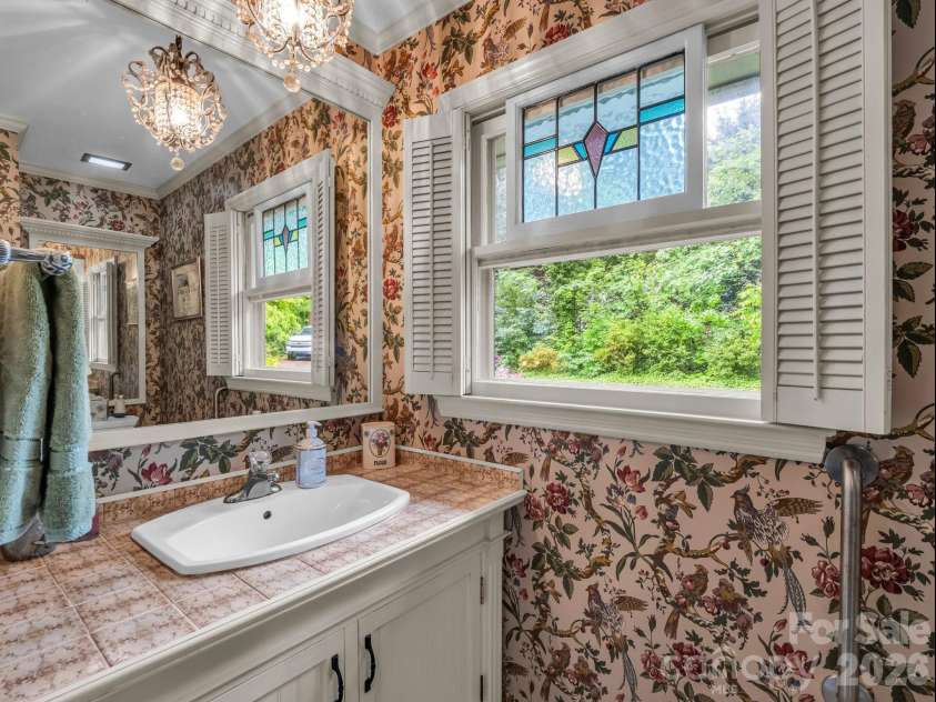 57 Tate Lane, Tryon, NC 28782.  MLS# CAR4378225, YatesRealty ID 21117. 