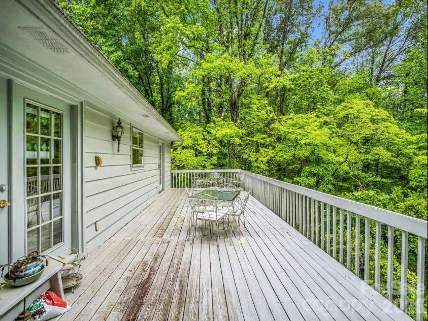 57 Tate Lane, Tryon, NC 28782.  MLS# CAR4378225, YatesRealty ID 21117. 