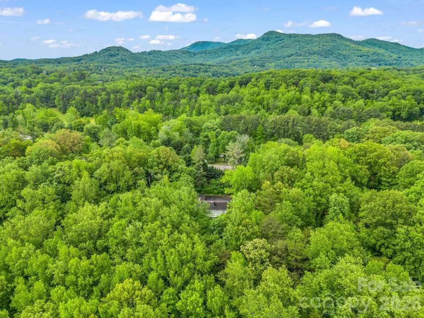 57 Tate Lane, Tryon, NC 28782.  MLS# CAR4378225, YatesRealty ID 21117. 