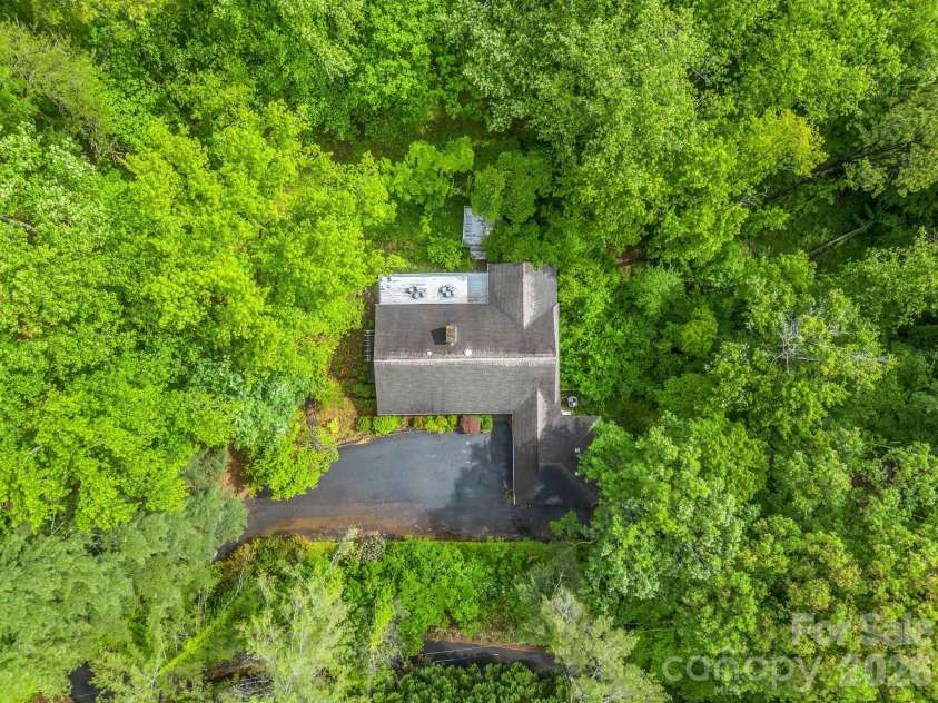 57 Tate Lane, Tryon, NC 28782.  MLS# CAR4378225, YatesRealty ID 21117. 