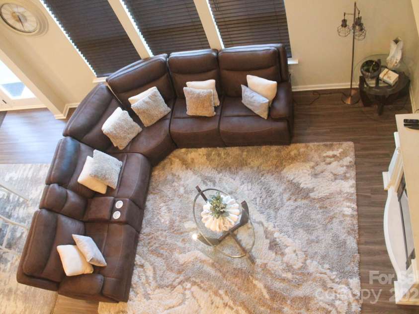 858 Oak Manor Drive, Concord, NC 28025.  MLS# CAR4268517, YatesRealty ID 21121. Oak Manor GreatRoom Down View A