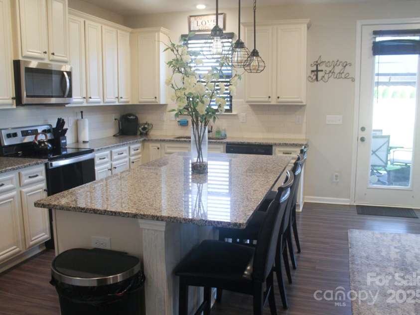858 Oak Manor Drive, Concord, NC 28025.  MLS# CAR4268517, YatesRealty ID 21121. Oak Manor Kitchen View C