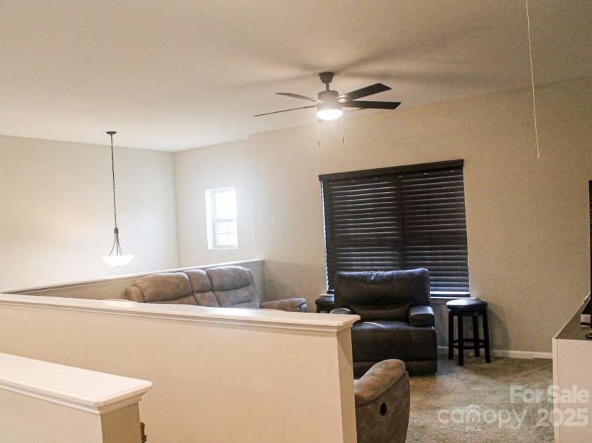 858 Oak Manor Drive, Concord, NC 28025.  MLS# CAR4268517, YatesRealty ID 21121. Oak Manor Loft View A