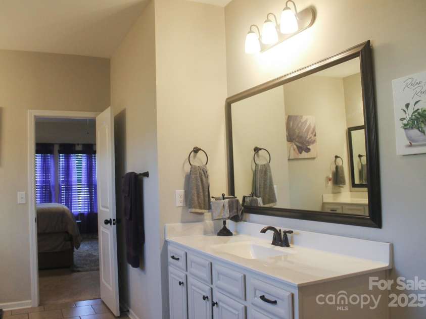 858 Oak Manor Drive, Concord, NC 28025.  MLS# CAR4268517, YatesRealty ID 21121. Oak Manor Owner's Suite Bath B