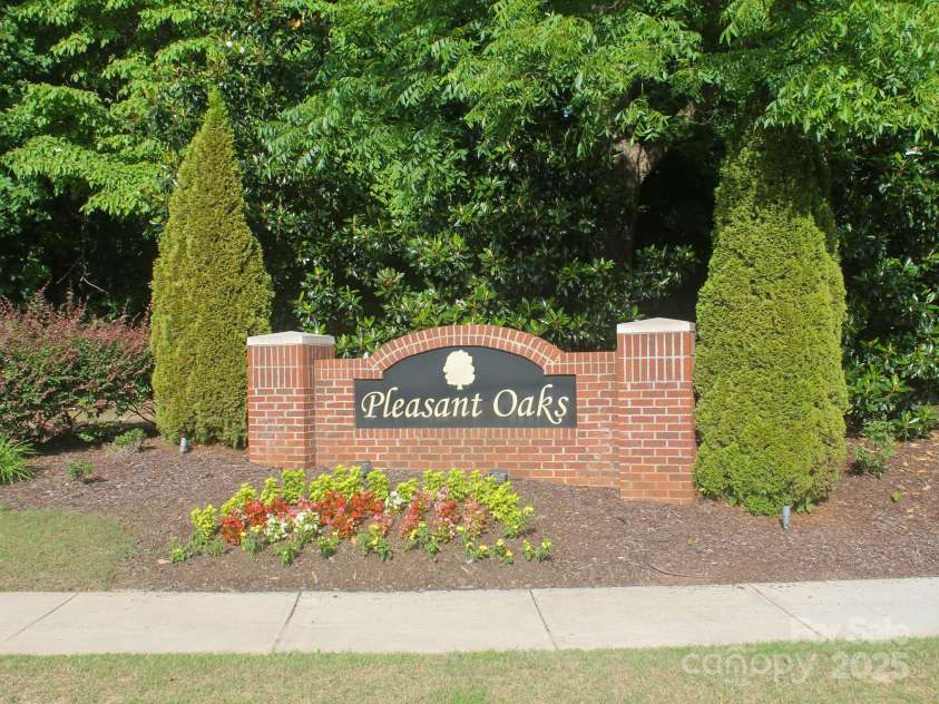 858 Oak Manor Drive, Concord, NC 28025.  MLS# CAR4268517, YatesRealty ID 21121. Pleasant Oaks Neighborhood Marquee