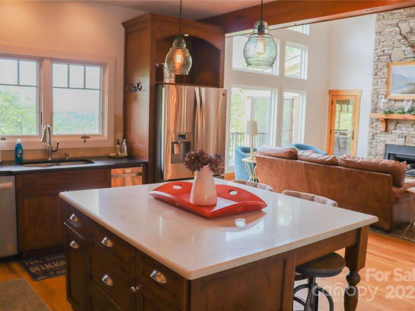 2839 Catawba Falls Parkway, Black Mountain, NC 28711.  MLS# CAR4273331, YatesRealty ID 21124. Kitchen looking toward living room