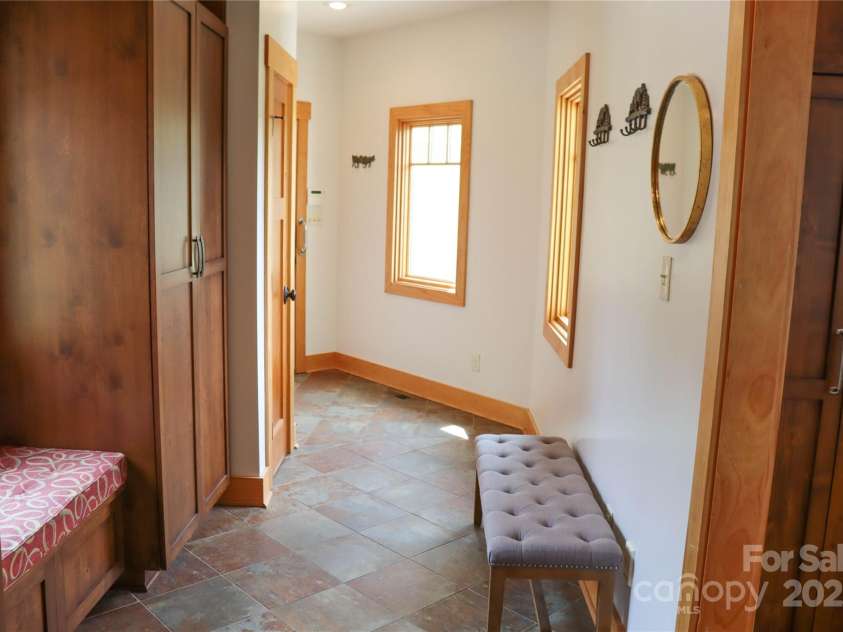 2839 Catawba Falls Parkway, Black Mountain, NC 28711.  MLS# CAR4273331, YatesRealty ID 21124. Mudroom from garage