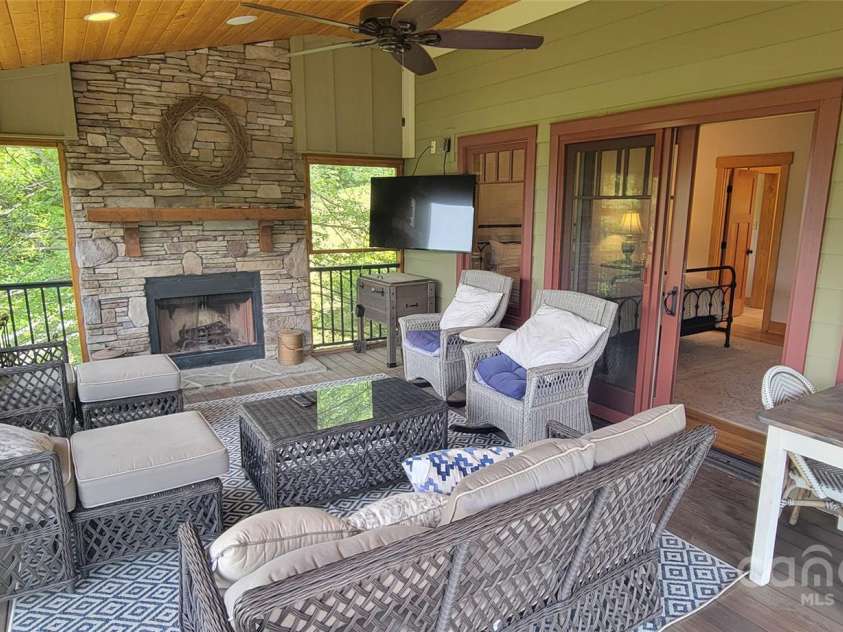 2839 Catawba Falls Parkway, Black Mountain, NC 28711.  MLS# CAR4273331, YatesRealty ID 21124. Screened in porch of primary bed room